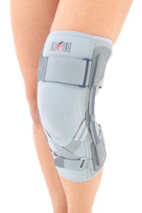 Sport Knee Brace With Leaf Spring Hinges And ACL Support